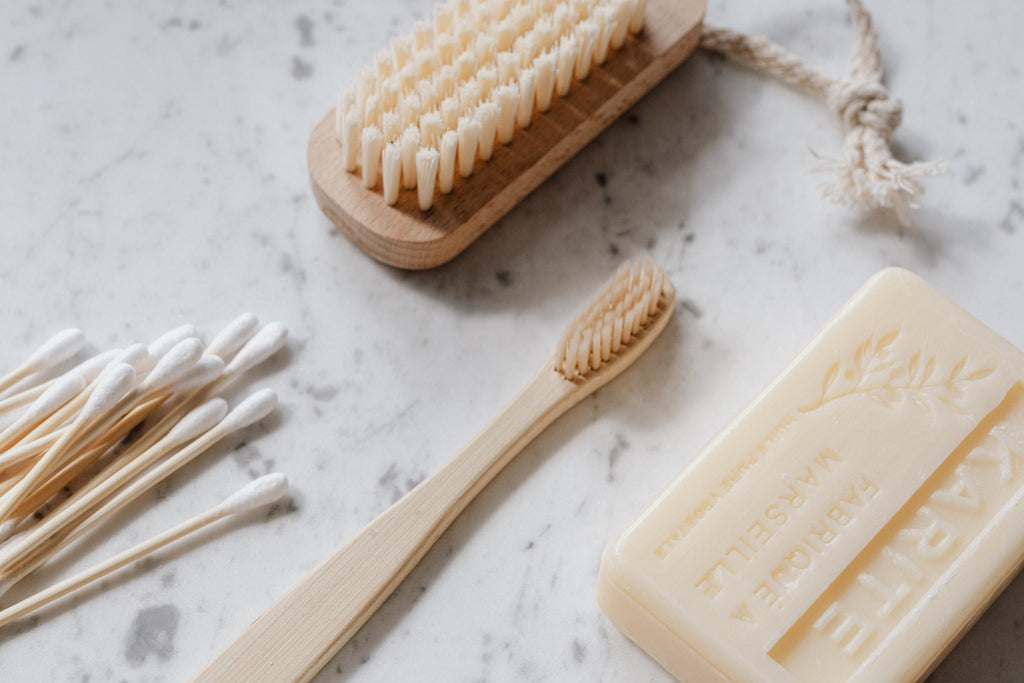 Natural beauty products. Bamboo toothbrush, organic cotton qtips
