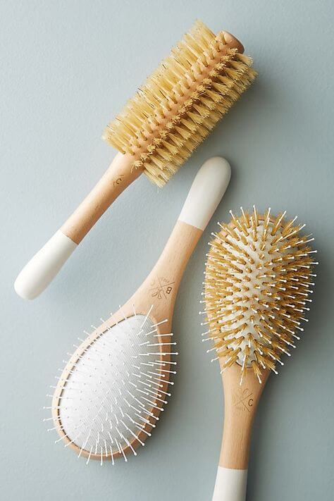 Variety of hair brushes - round brush and paddle brushes