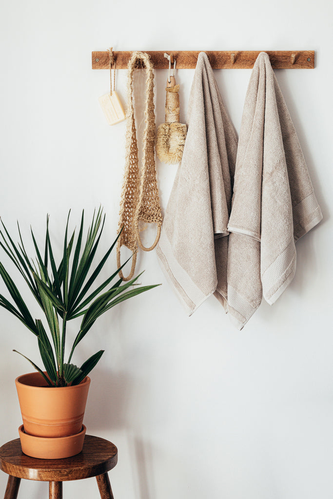 Boho spa towels hanging on the wall
